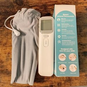 NEW! Forehead and ear thermometer with batteries included!